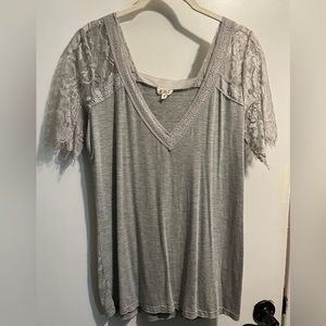 Boutique brand top with beautiful lace detail on top and sleeves, size small